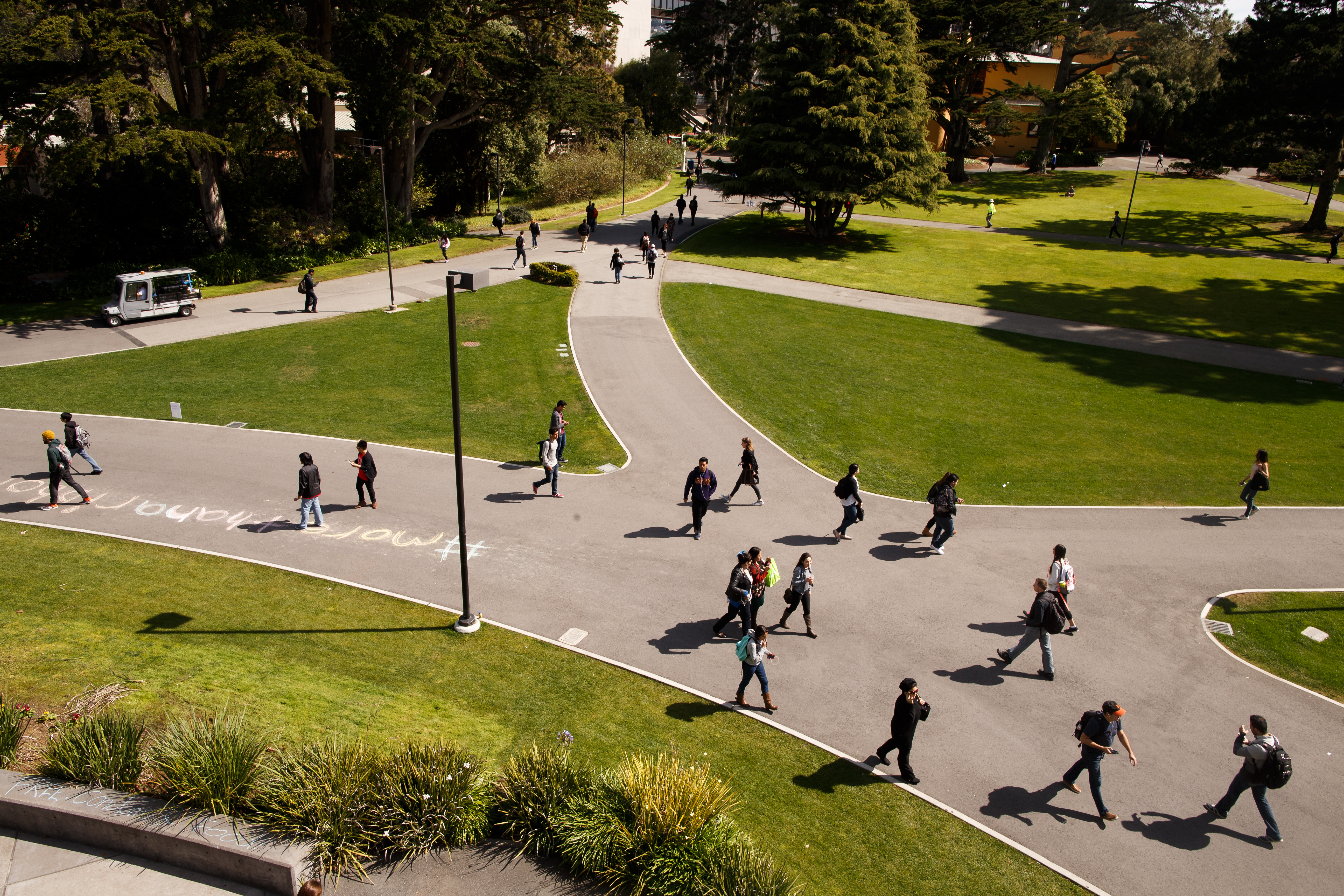 Pathways on campus with students walking in various directions